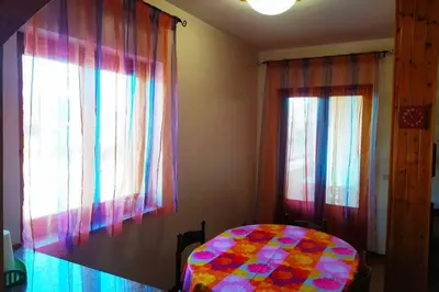 Letto o letti in una camera di Marianna's house for your holidays (near Taormina)