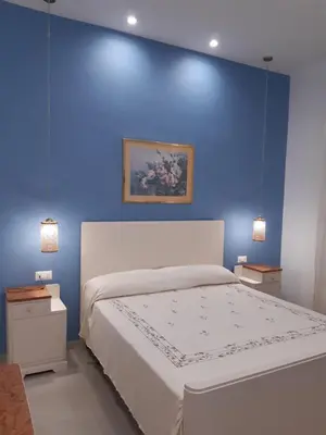 Letto o letti in una camera di Casa RoSa