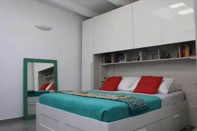Letto o letti in una camera di La Quintecita villa con piscina privata - vicino Catania e Etna