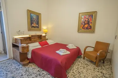Letto o letti in una camera di Casa Siciliana nel Centro Storico di Catania 3 Camere 10 Ospiti 119m2