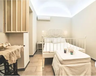 Letto o letti in una camera di Il Cortiletto