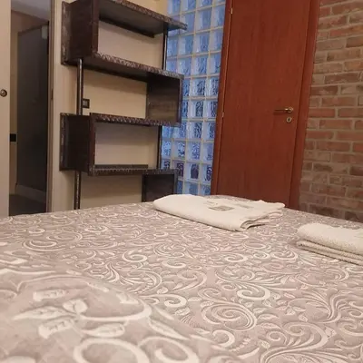 Letto o letti in una camera di Oasi del Borgo
