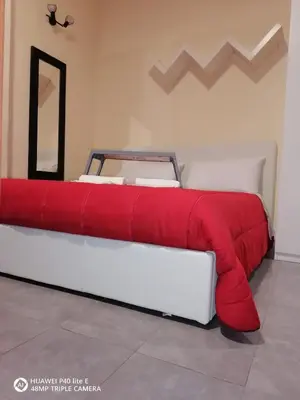 Letto o letti in una camera di Oasi del Borgo