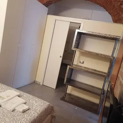 Letto o letti in una camera di Oasi del Borgo