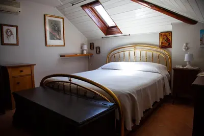 Letto o letti in una camera di MAGIA & EMOZIONI - Trecastagni- Falde ETNA Villa vista mare