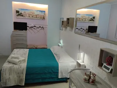 Letto o letti in una camera di Fiori dell'Etna Apartment