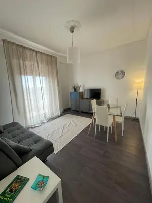 Area soggiorno di Cibali Metro Stay