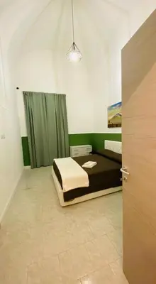 Letto o letti in una camera di Il Vicolo Home 2