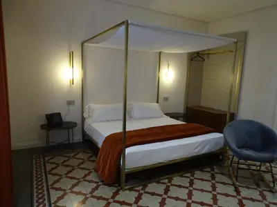 Letto o letti in una camera di 20 Miglia Albergo Diffuso