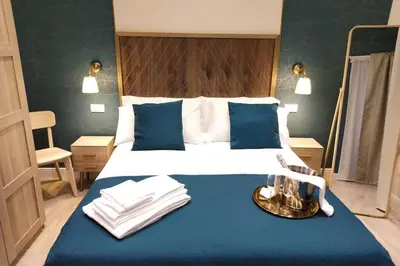 Letto o letti in una camera di D'Annunzio Street Home(Appartamento uso turistico)