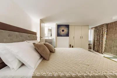 Letto o letti in una camera di BacoSuite