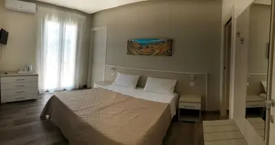Letto o letti in una camera di La Conca