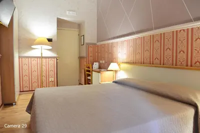 Letto o letti in una camera di Catania Centro Rooms