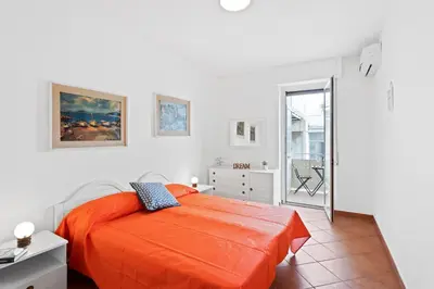 Letto o letti in una camera di GuestHost - Aci Castello Seaview Apartment with Parking