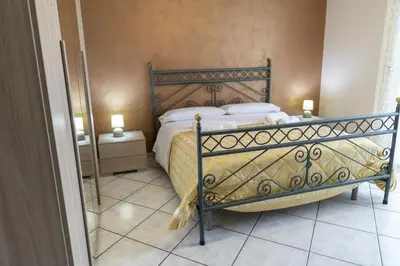 Letto o letti in una camera di Grotta del Monaco