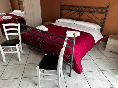 Letto o letti in una camera di Grotta del Monaco