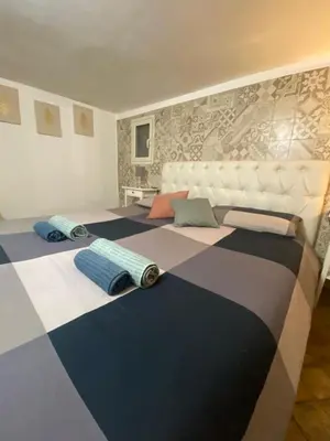 Letto o letti in una camera di Florhouse Pacini