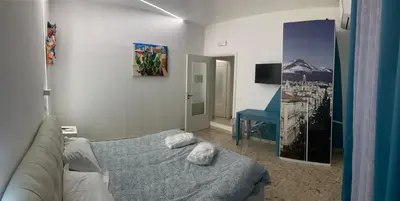 TV o dispositivi per l'intrattenimento presso Catania Apartment Borgo Suite Autonomous