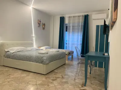 Letto o letti in una camera di Catania Apartment Borgo Suite Autonomous