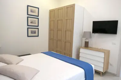 Letto o letti in una camera di Casa Consoli