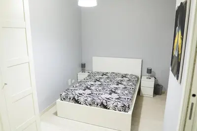 Letto o letti in una camera di Casa Mitch
