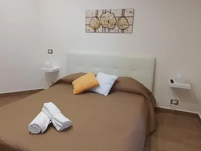 Letto o letti in una camera di Villa Martina