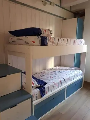 Letto o letti in una camera di donna serena Aci Castello