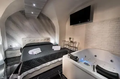 Letto o letti in una camera di Suite Vico li cuti