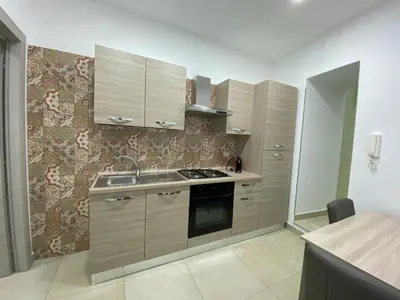 Cucina o angolo cottura di Vecchia Ognina Apartments Catania - free Parking
