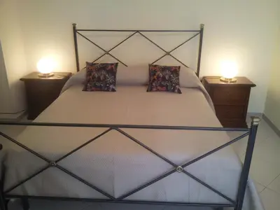 Letto o letti in una camera di AL NARCISO HOUSE by Franco e Lia