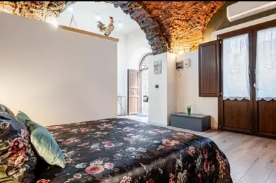 Letto o letti in una camera di Spazio apartments Suite Crociferi