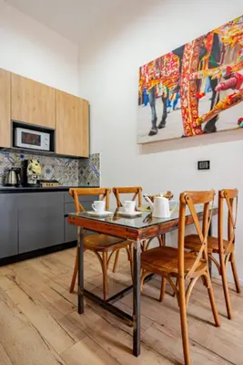 Cucina o angolo cottura di Spazio apartments Suite Crociferi