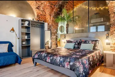 Letto o letti in una camera di Spazio apartments Suite Crociferi