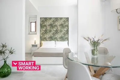 Letto o letti in una camera di Euphorbia Apartment by Wonderful Italy