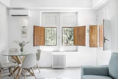 Area soggiorno di Euphorbia Apartment by Wonderful Italy