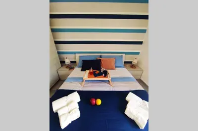 Letto o letti in una camera di Casa Angelina a due passi dal mare