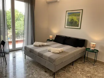 Letto o letti in una camera di Cutapp Guest House