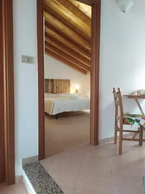 Letto o letti in una camera di Casi Home
