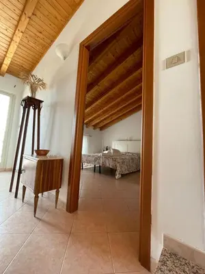 Letto o letti in una camera di Casi Home