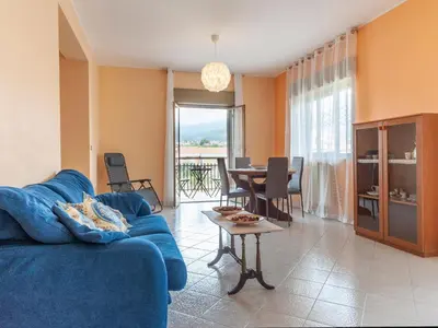 Area soggiorno di Etna & Sea View Apartment