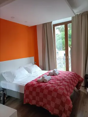 Letto o letti in una camera di Luxury B&B Iolanda