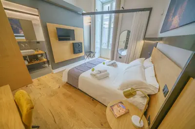 Letto o letti in una camera di Cafuné Rooms