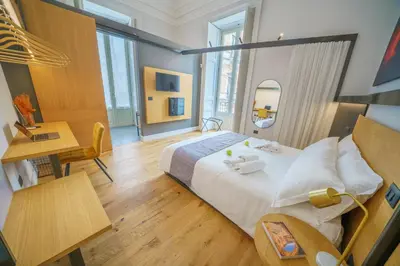 Letto o letti in una camera di Cafuné Rooms