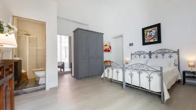 Letto o letti in una camera di Donna Fortuna
