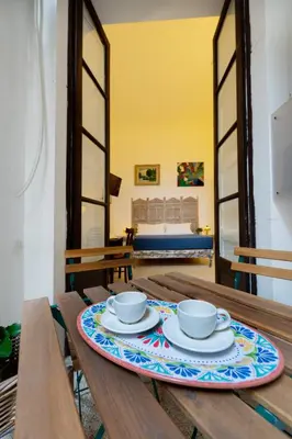 Letto o letti in una camera di Donna Fortuna