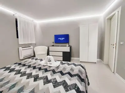 Letto o letti in una camera di Daydreamer House - Via Etnea 646