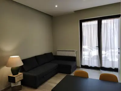 Area soggiorno di Gelsonero Apartments
