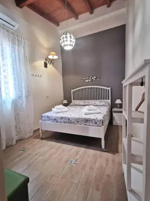 Letto o letti in una camera di Cottage Regina Bianca, tutto ciò che desideri!