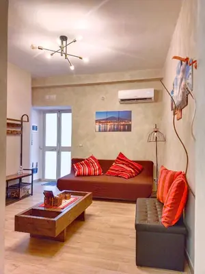 Area soggiorno di EtnaCiTy Guest House Apartment