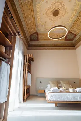 Letto o letti in una camera di ETNEA Suite 270